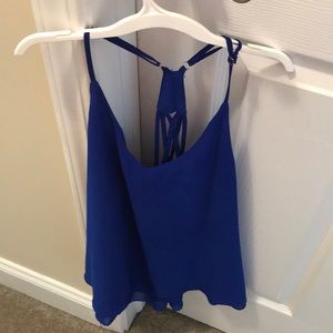 blue strapped blouse!